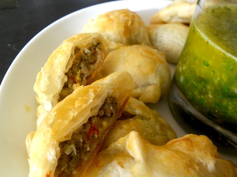 Stuffed, fried and doused in spicy aji, empanadas are a Colombian Independence Day essential.