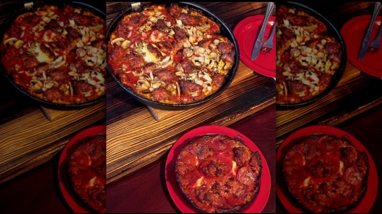 Top-view of a sausage-and-veggie-topped pizza and a pepperoni pizza from Pequod's