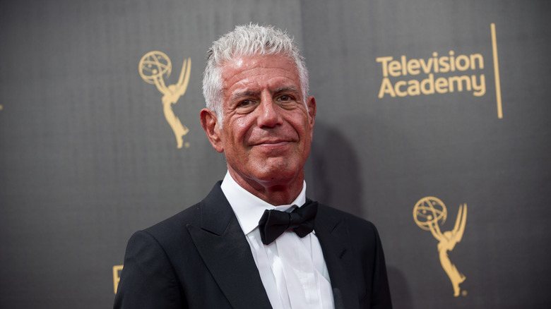 Anthony Bourdain smiling at an event