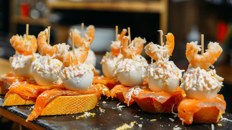Seafood pintxos on a bar counter in San Sebastian