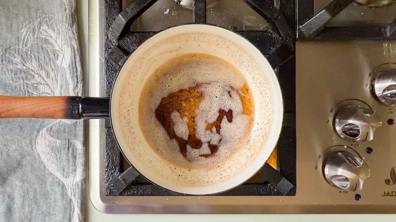 Brown butter in saucepan on stovetop