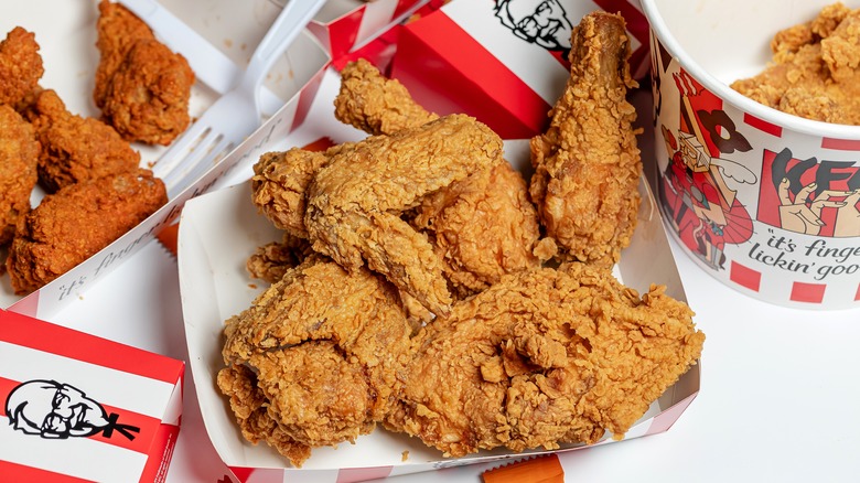 Fried chicken from KFC in paper plates