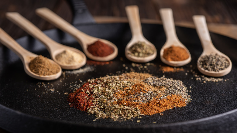Blend of spices on black plate