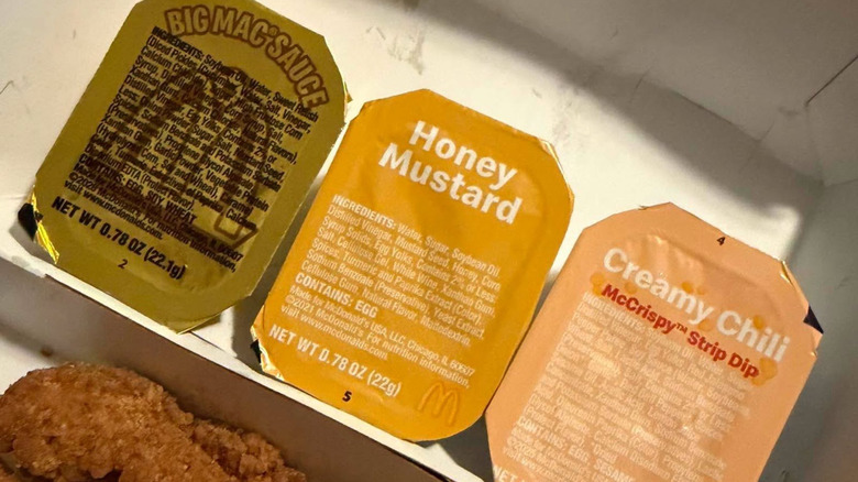 McDonald's sauces sit in a row.