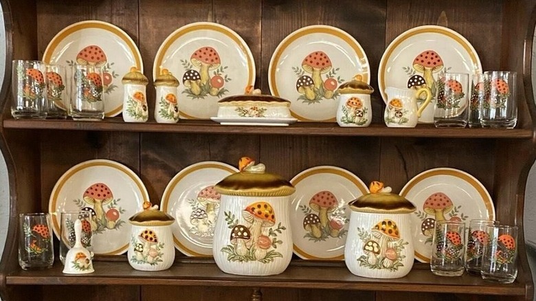A full collection of Sears' Merry Mushrooms displayed in an armoire