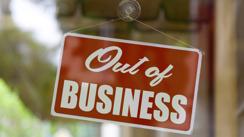 Out of business sign in store window
