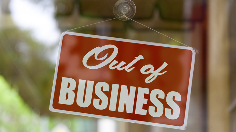 Out of business sign in store window