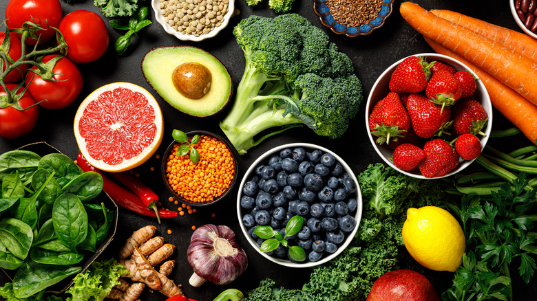 fruits and vegetables on a black background