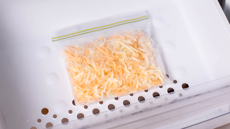 Frozen grated cheese in a bag in the freezer
