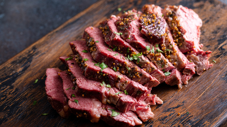 Slices of corned beef on a cutting board