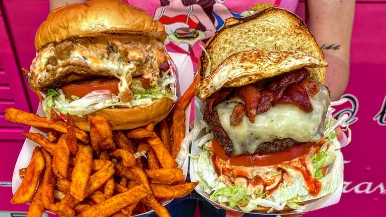 two burgers and fries