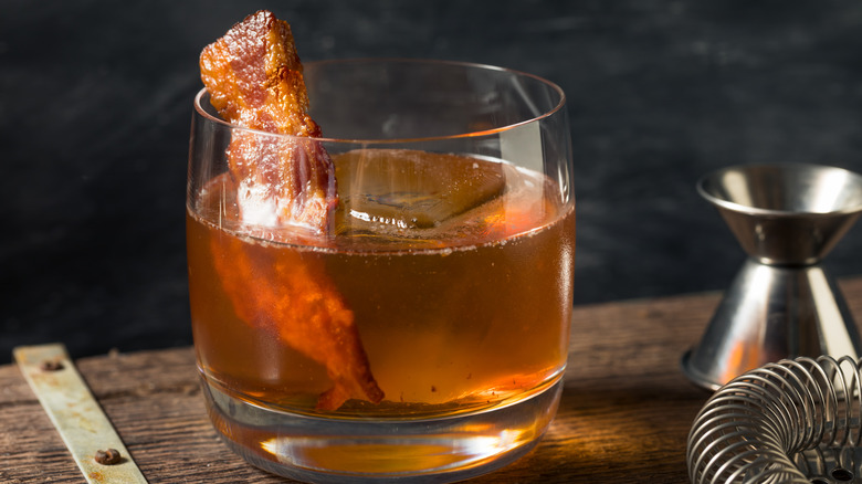 Bacon strip in an Old Fashioned cocktail 