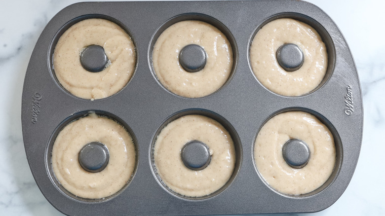 donut dough in donut pan
