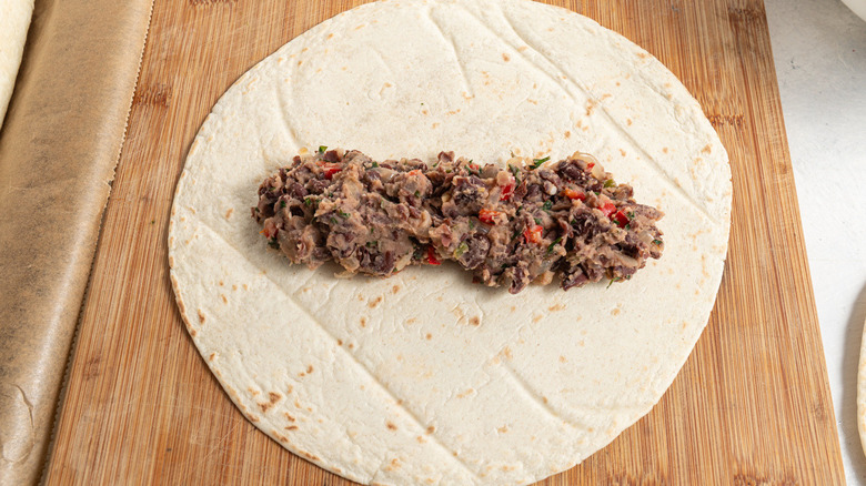 black beans in flour tortilla