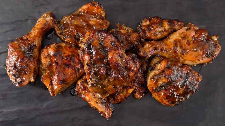 Various cuts of barbecue chicken