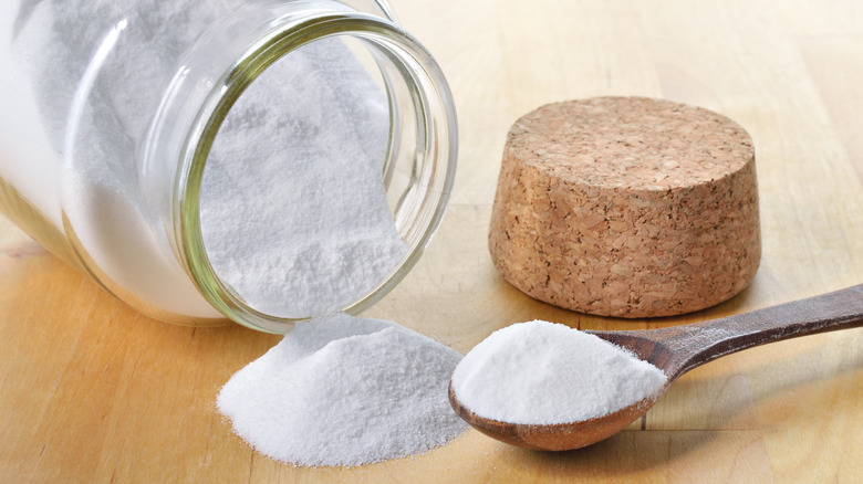 Wooden spoon with baking soda