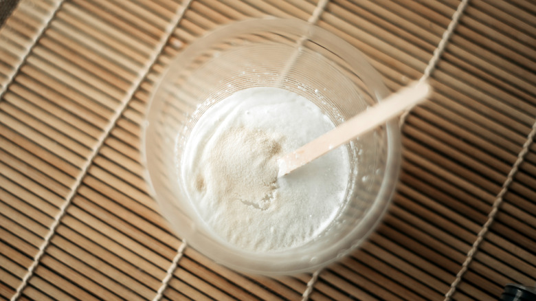 Bowl of baking soda on bamboo