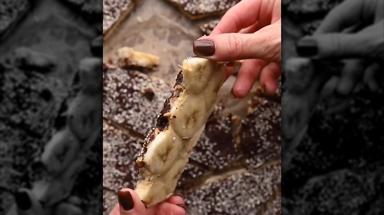 Banana bark topped with sesame seeds