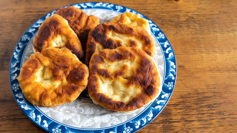 Bannock bread on a blue and white plate