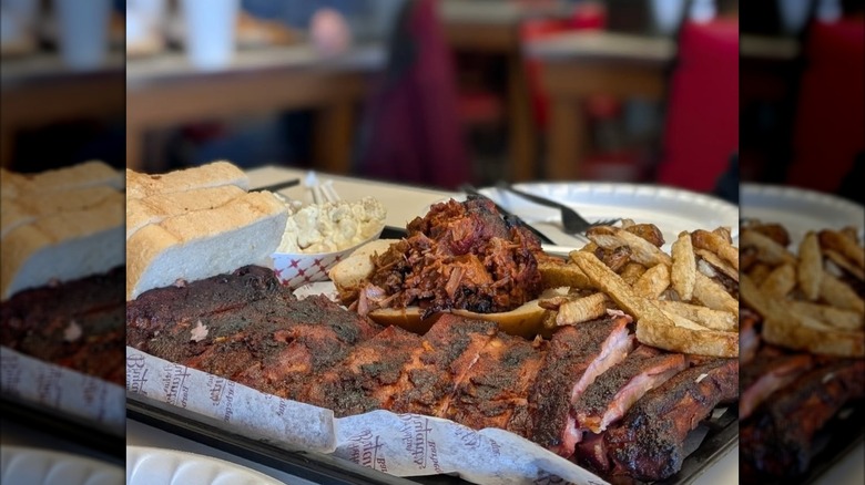 Arthur Bryants ribs with white bread, pulled pork, fries, and sides