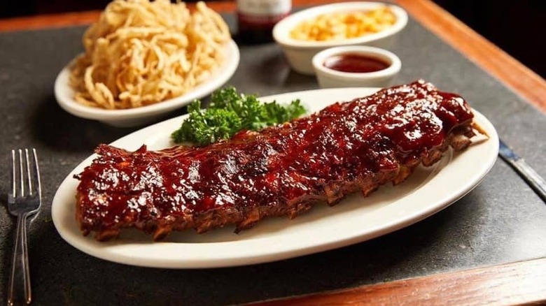 White platter of Montgomery inn ribs and sides