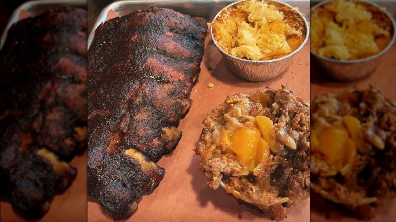 A tray with ribs, Mac and cheese, and peach cobbler from Smoque