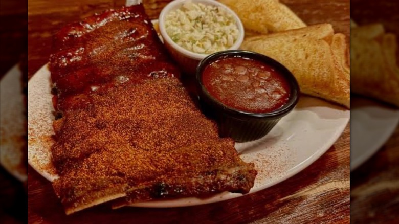 a plate of ribs from Bar B Que shop with beans, slaw, and Texas toast