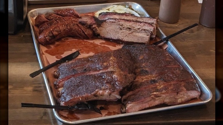 A tray of various meats including beef ribs at Bain Barbecue in Memphis, Tennessee