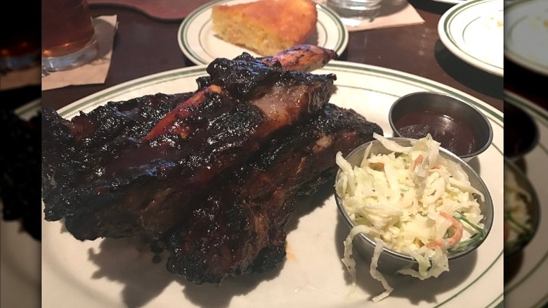 A plate of Wagyu beef ribs and slaw at L. Woods Tap & Pine Lodge  in Lincolnwood, Illinois