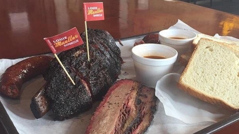 A tray of barbecue including large ribs at Louie Mueller Barbecue in Taylor, Texas