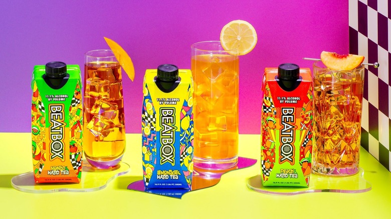 BeatBox hard teas in single-serve cartons with glasses of drink