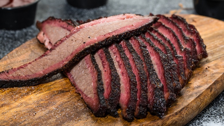 Sliced beef brisket on a cutting board