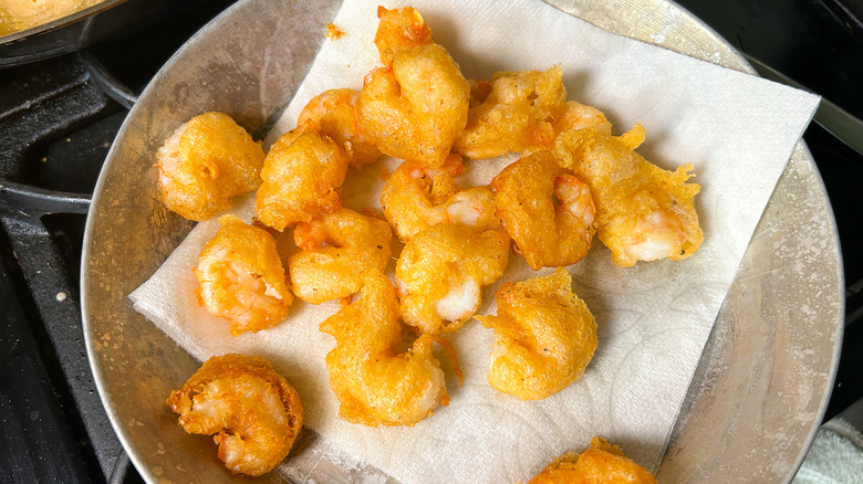 fried shrimp on paper towel