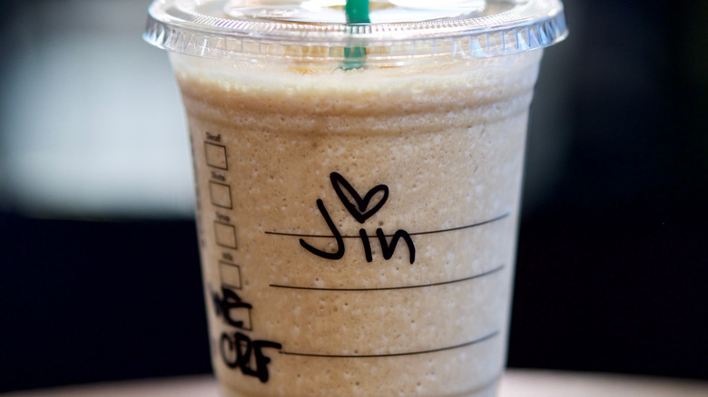 Starbucks cup with name written on it