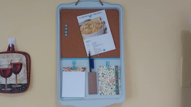 A sheet tray memo board hanging on the wall