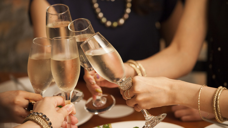toasting champagne glasses