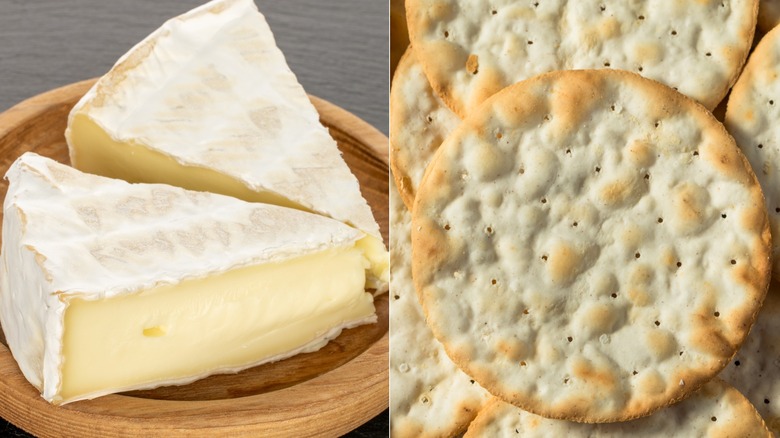 brie cheese on wooden plate and water crackers