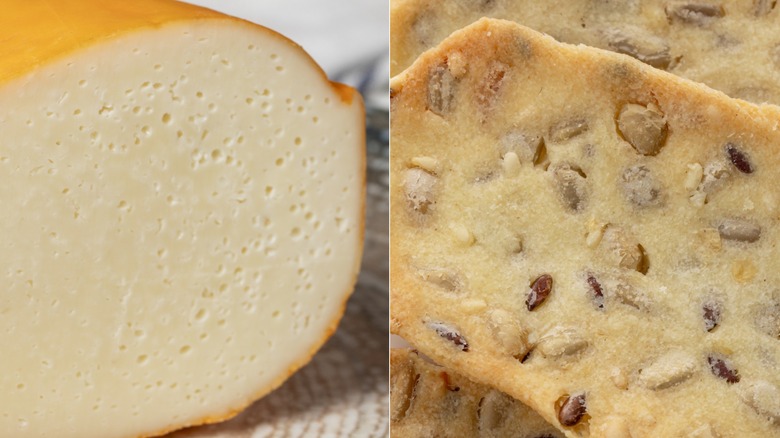 wedge of gouda with orange rind and close-up of multigrain cracker