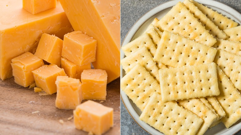 cheddar cheese cubes and butter crackers on plate