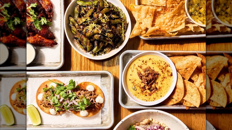 Various dishes, such as tacos and queso, served at Loro.