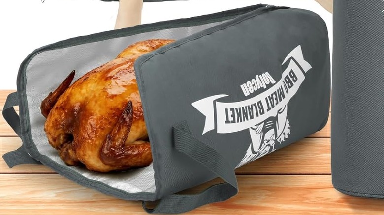 A turkey sits inside a resting sleeve.