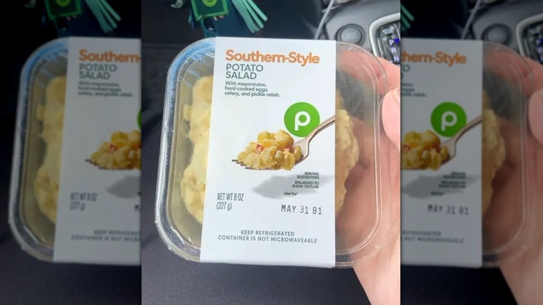 Publix Southern Style Potato Salad unopened in someone's hand.
