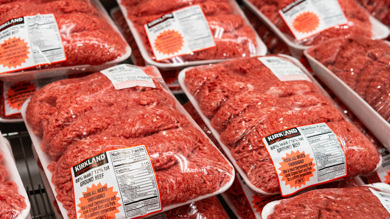 Packages of ground beef in the refrigerator aisle