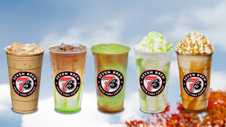 A variety of fall-themed drinks are suspended in mid-air.