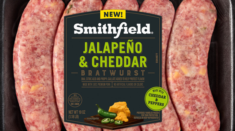Closeup of Smithfield Jalapeño & Cheddar Brats on a grill