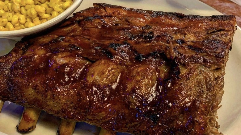 Order of Texas Roadhouse ribs served with seasoned corn
