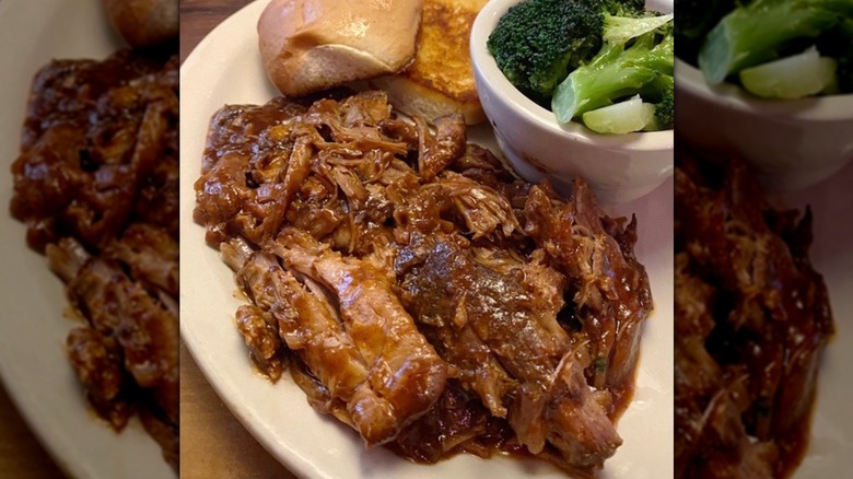Pulled Pork Dinner served with broccoli and fresh baked bread