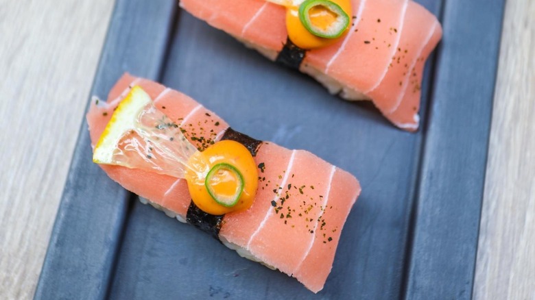 Vegan sliced tapioca sushi with lemon and spicy mayo