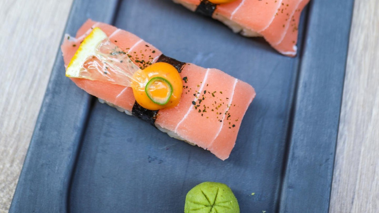 Vegan sliced tapioca sushi with lemon and spicy mayo
