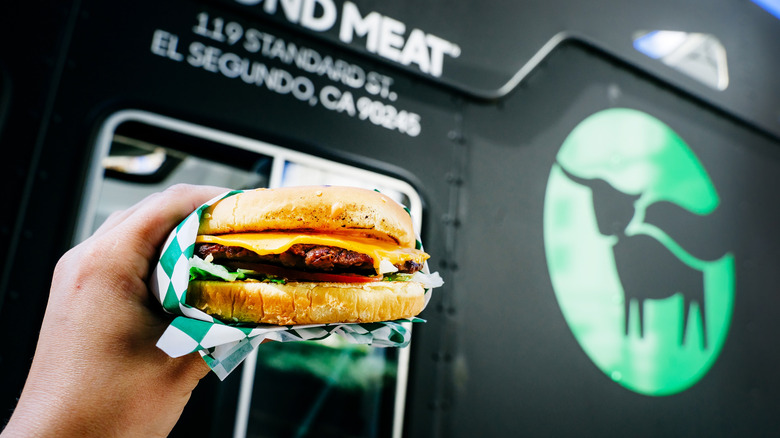 Beyond meat burger in front of a Beyond meat food truck
